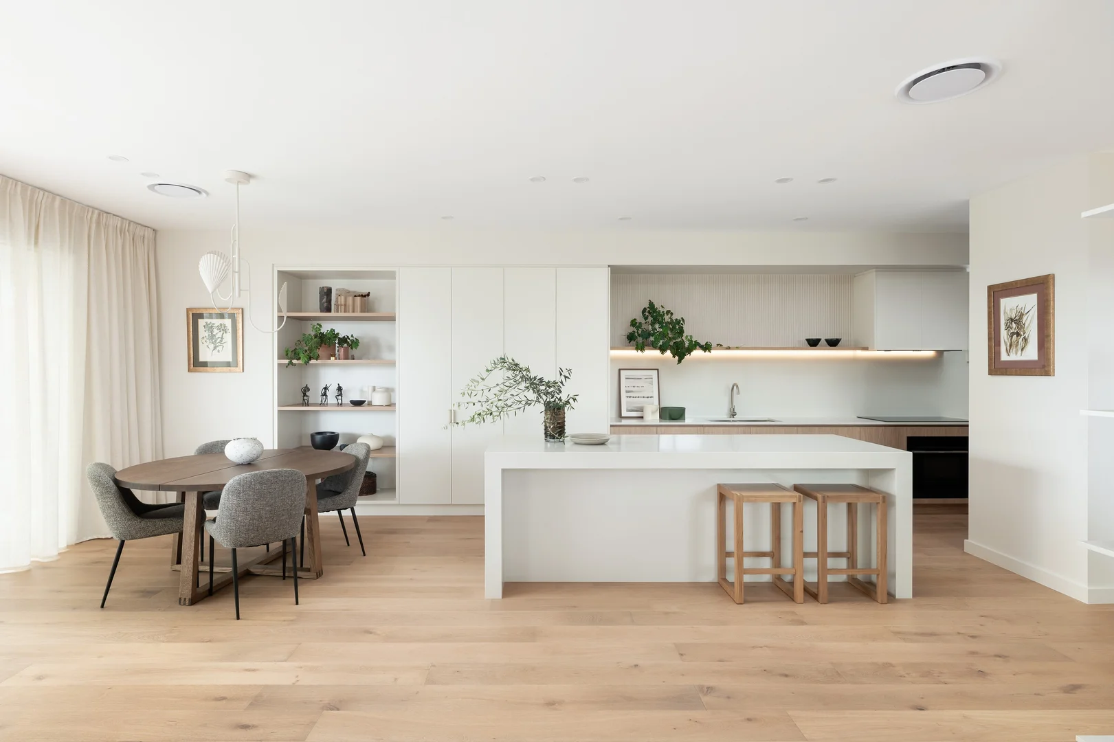 Home 01 · Channel Nine kitchen and dining space with pale timber, stone and natural light